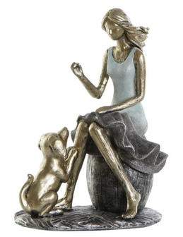 Sculptuur meisje met hond